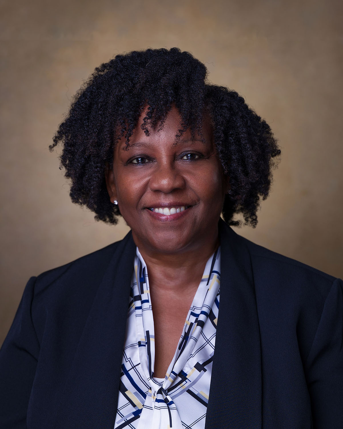 Headshot of Demetria “Dee” Jones